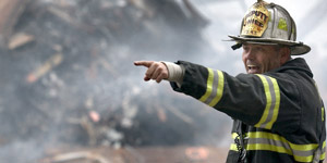image of a fireman fighting a fire